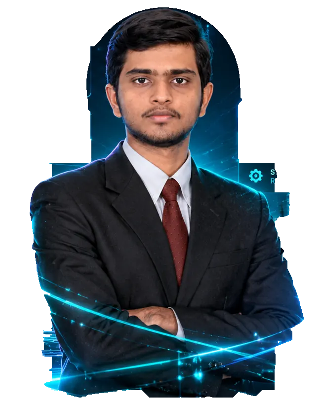 Bhuvanesh Kumar R standing with folded arms in a formal suit